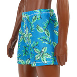 Barbie Ken Beach Doll with Black Hair Dressed in Blue Tropical Swim Trunks